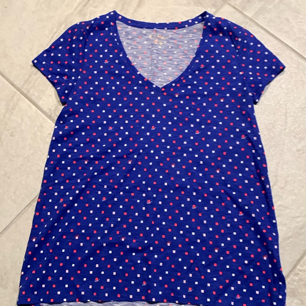 Lilly pulled her extra extra small cotton T-shirt